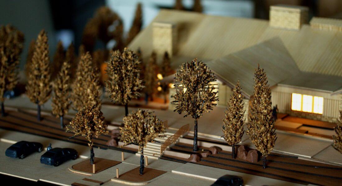 timber house set within a landscape terrain